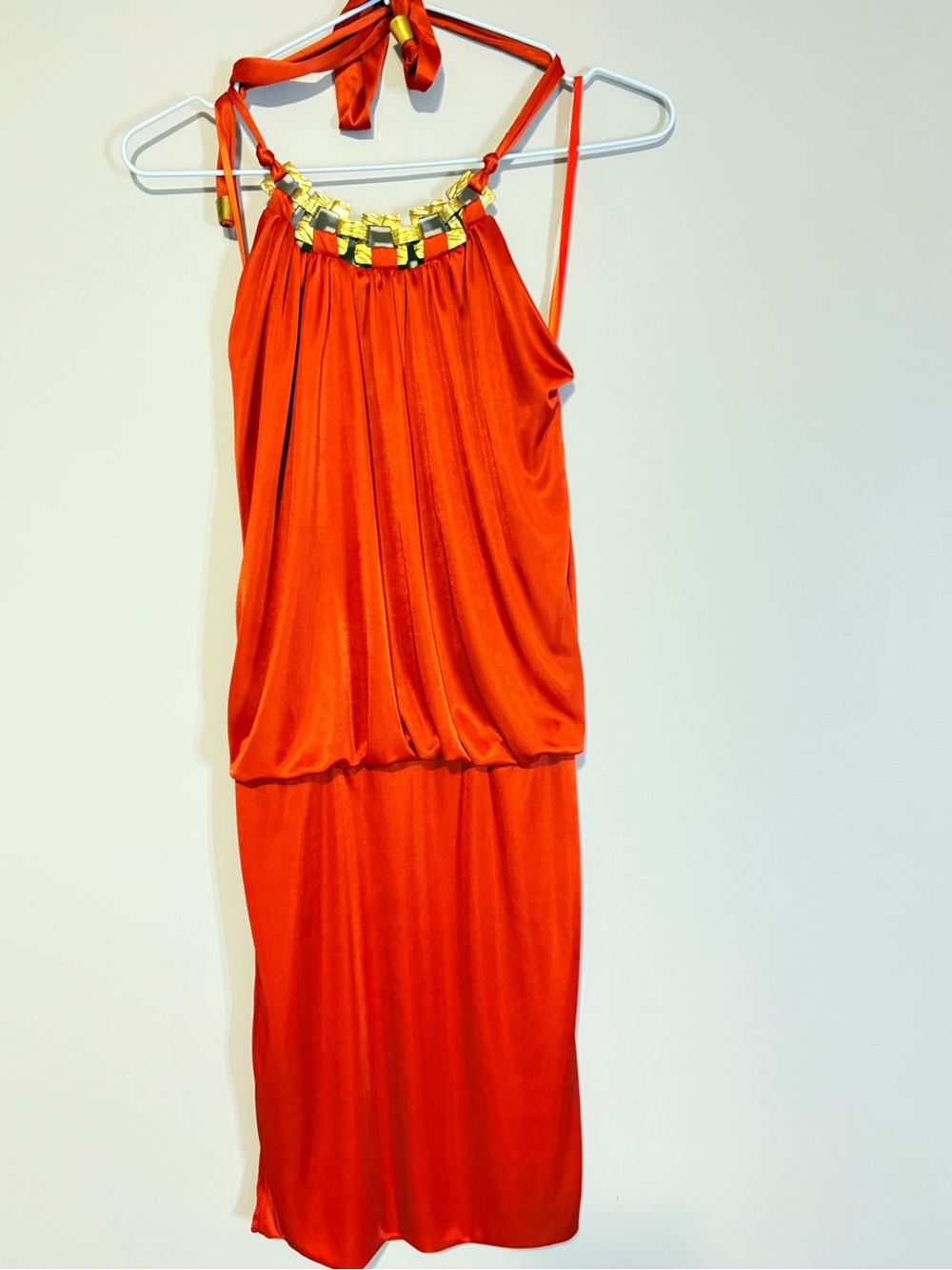 Stunning and vibrant with a gorgeous gold embellished neckline
